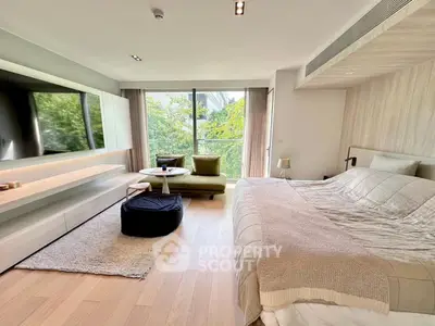 Luxurious modern bedroom with large window and stylish decor