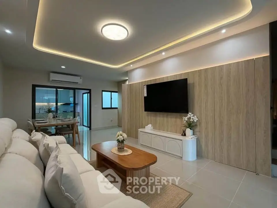 Modern living room with elegant lighting and stylish furniture