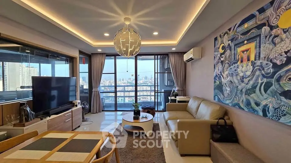 Spacious modern living room with city view, stylish decor, and ample natural light.
