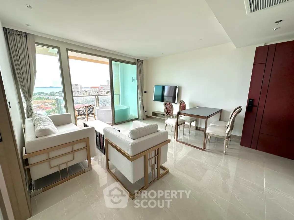 Luxurious living room with elegant furniture and balcony view