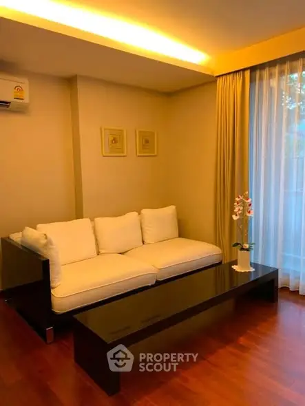 Elegant living room with modern sofa and ambient lighting