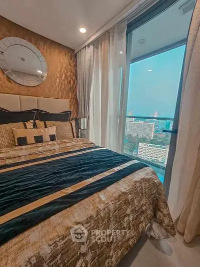 Luxurious bedroom with stunning city view and elegant decor