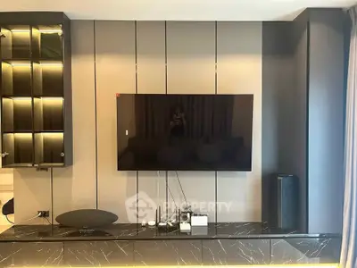 Modern living room with sleek TV setup and stylish decor