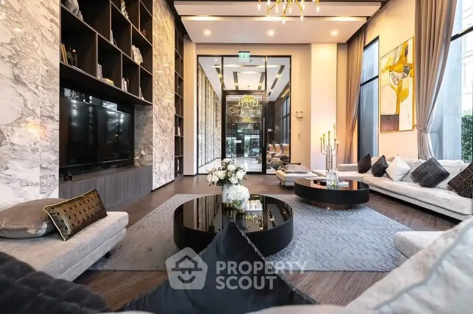 Luxurious modern living room with elegant decor and marble accents