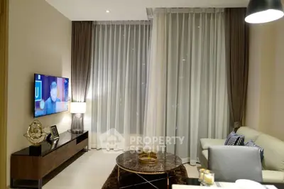 Elegant living room with modern decor and ambient lighting