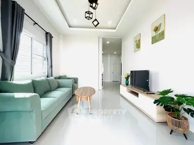 Modern living room with sleek furniture and natural light