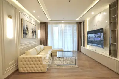 Luxurious modern living room with elegant decor and large TV