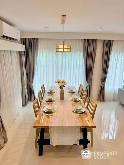 Elegant dining room with wooden table and modern decor