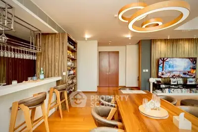 Luxurious modern living room with stylish bar and elegant lighting
