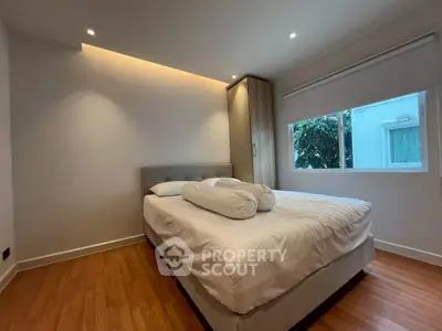 Cozy bedroom with modern design and natural light