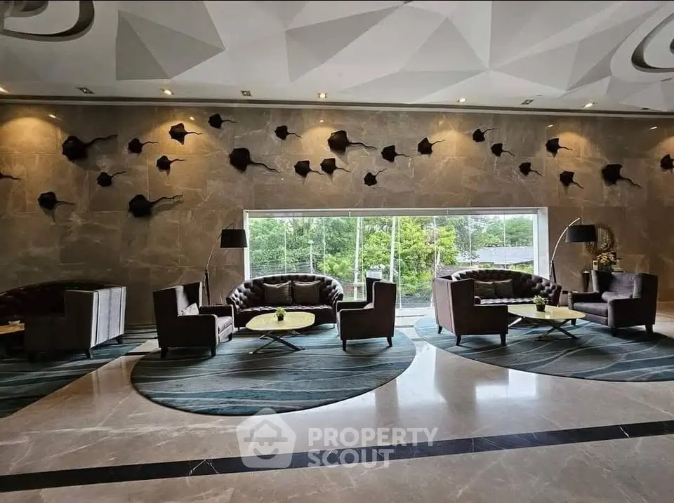 Luxurious modern lobby with stylish furniture and large window view