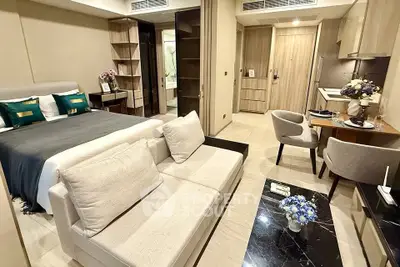 Luxurious studio apartment with modern decor, open layout, and elegant furnishings.