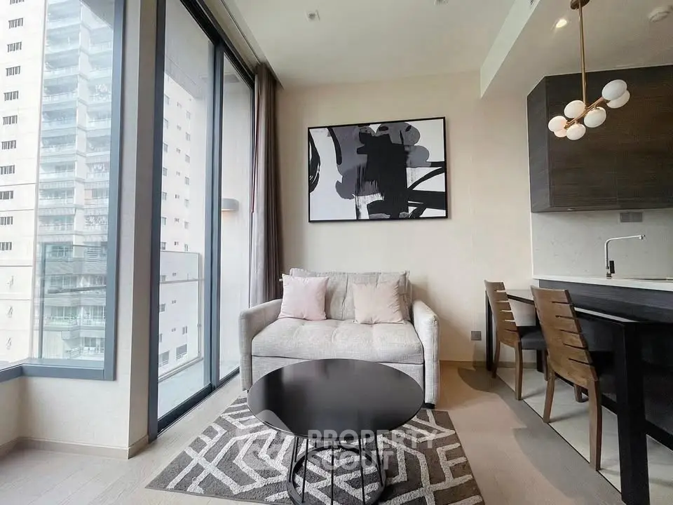 Modern living room with stylish decor and large windows in a high-rise apartment