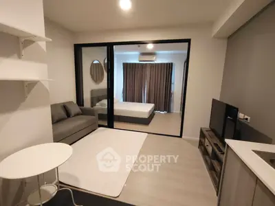 Modern studio apartment with open layout and stylish furnishings