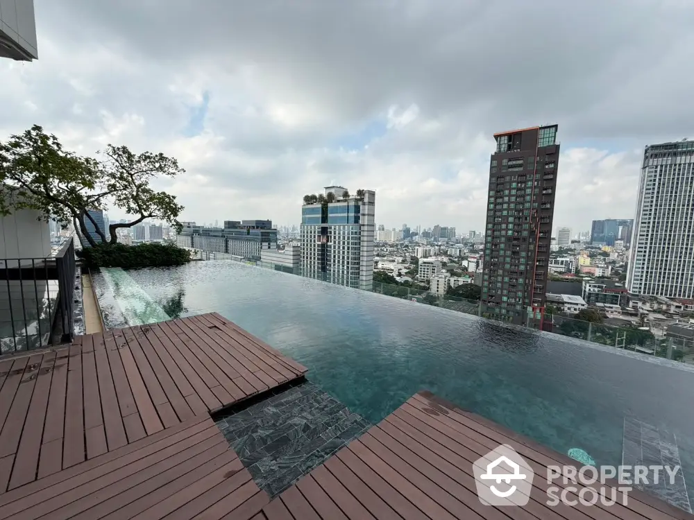 Stunning rooftop infinity pool with panoramic city skyline views