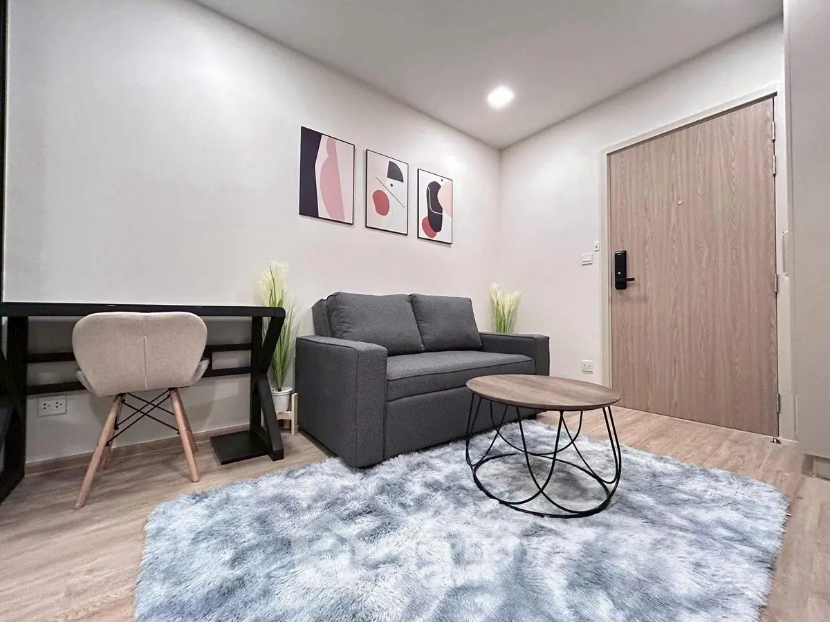 Modern living room with stylish decor and cozy seating area