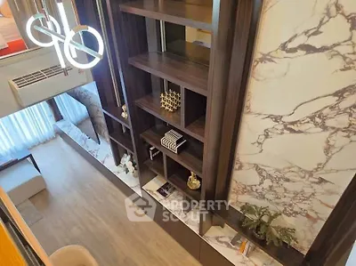 Luxurious modern living room with elegant shelving and marble accents