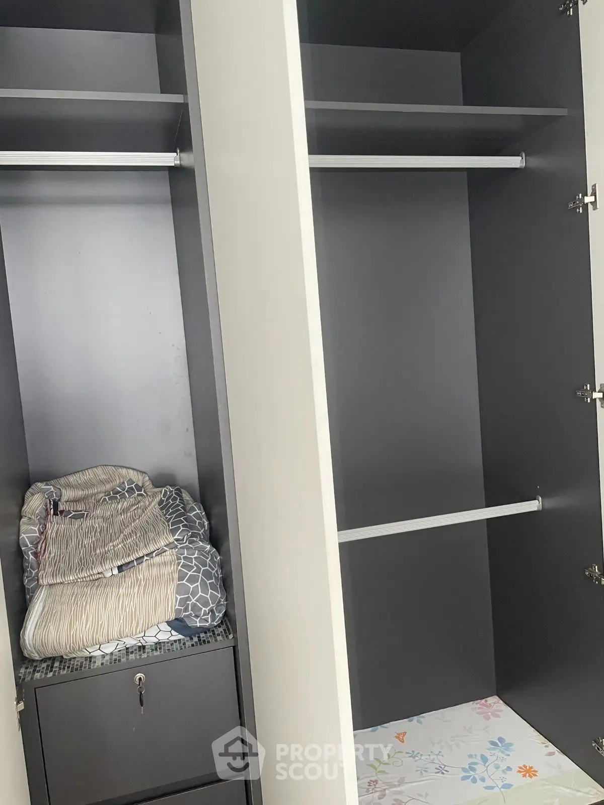Spacious modern wardrobe with ample storage space and sleek design.