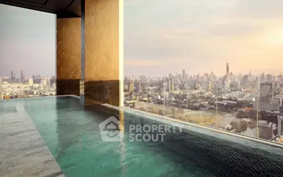 Luxurious rooftop infinity pool with stunning city skyline view at sunset.