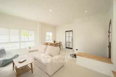 Bright and airy living room with modern furniture and natural light