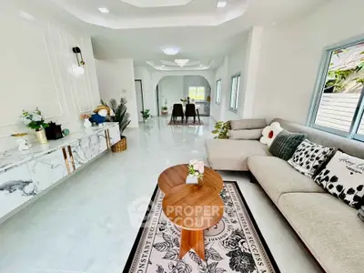 Spacious modern living room with elegant decor and cozy seating area