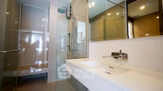 Modern bathroom with sleek design and spacious shower area