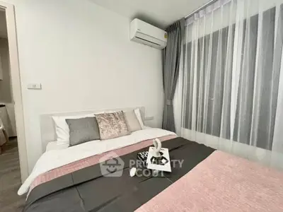 Cozy modern bedroom with stylish decor and natural light