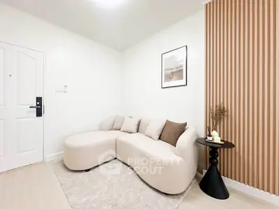 Modern living room with stylish beige sofa and elegant decor