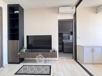 Modern living room with sleek TV unit and air conditioning