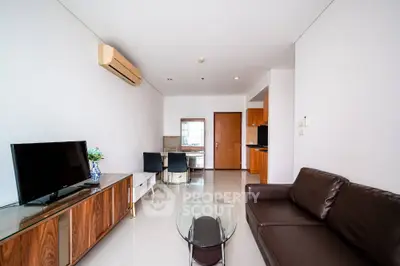 Modern living room with sleek furniture and open layout in a stylish apartment