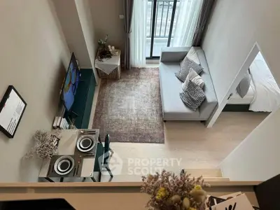 Modern loft apartment with stylish living room and cozy bedroom