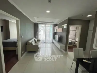 Spacious modern living room with elegant decor and natural light