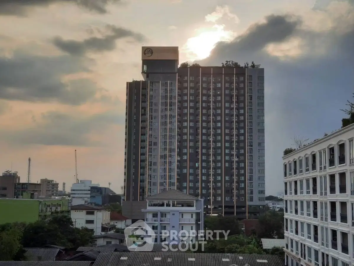 Stunning high-rise building with sunset view in urban landscape