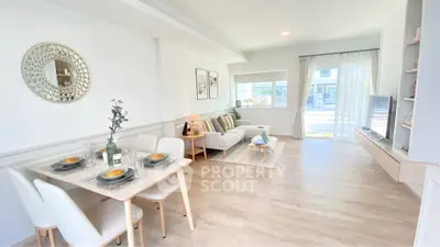 Bright and airy living room with modern decor and large windows