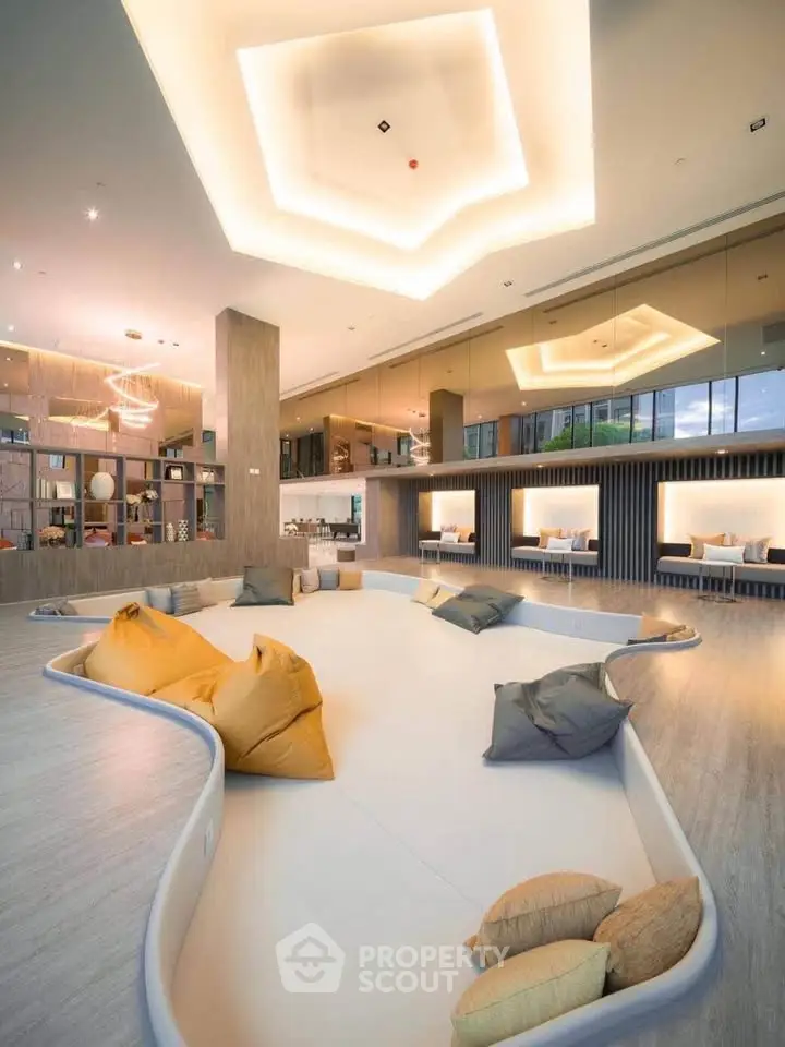 Luxurious modern interior with sunken seating area and stylish lighting, perfect for relaxation and social gatherings.