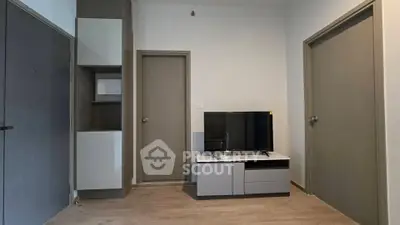 Modern living room with sleek TV unit and minimalist design