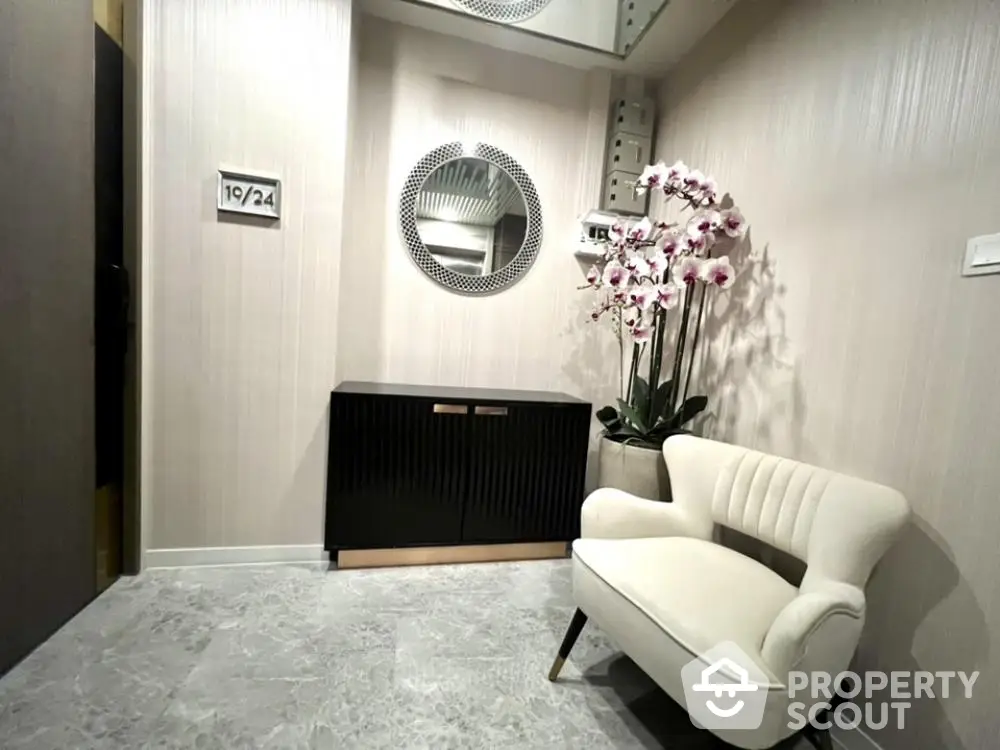 Elegant apartment entrance with stylish decor and modern furniture