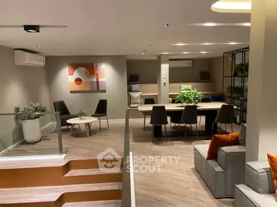 Modern living room with stylish decor and open seating area