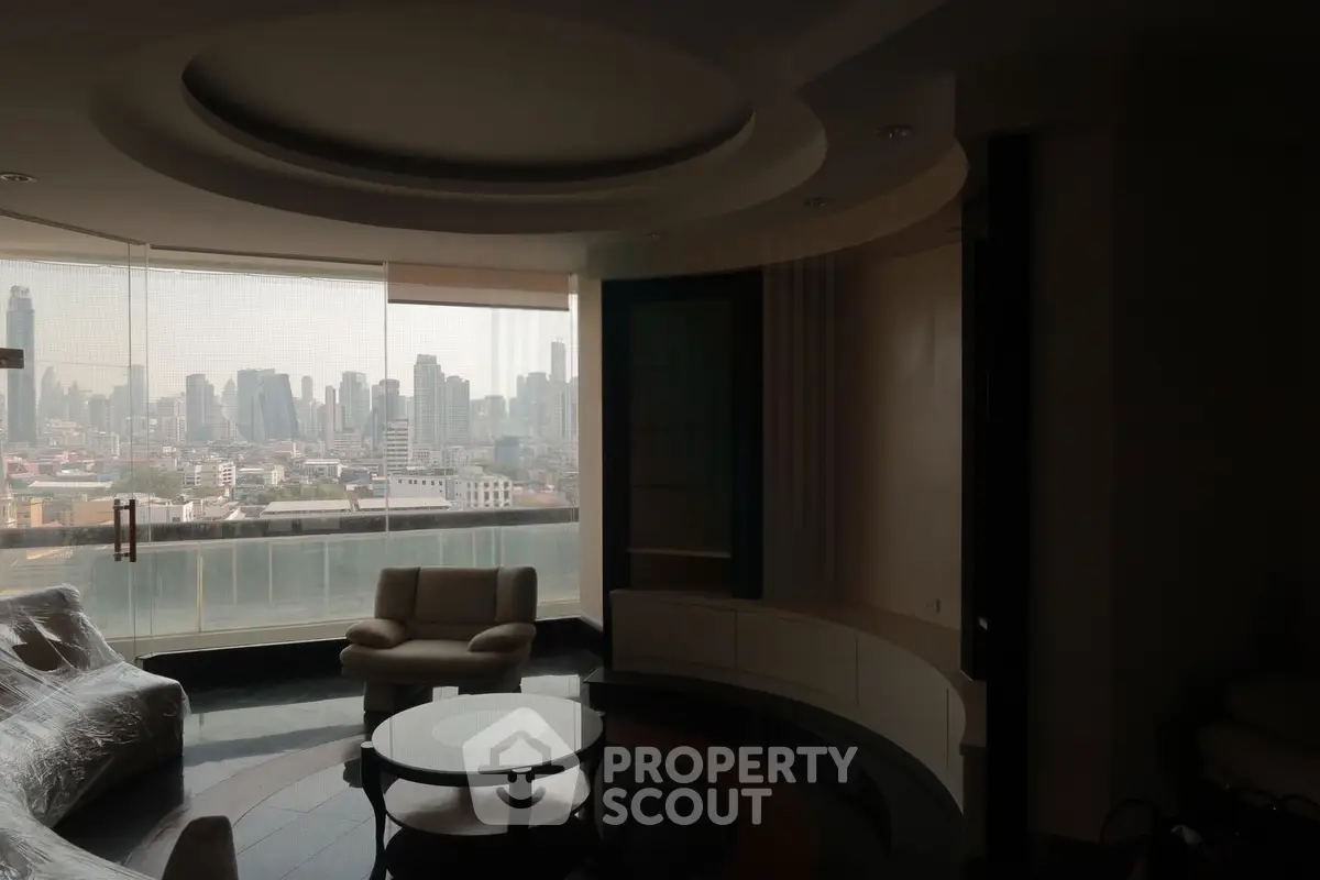 Luxurious living room with panoramic city view and elegant furniture