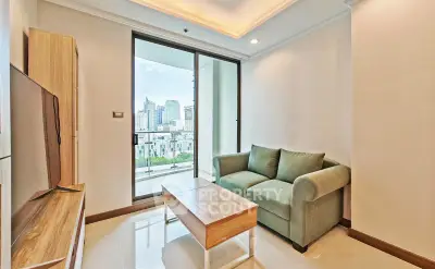 Modern living room with city view, featuring a cozy sofa and sleek wooden furniture, perfect for urban living.