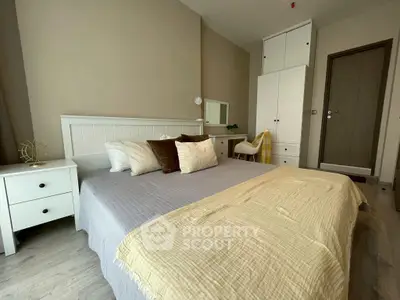 Cozy bedroom with modern decor and ample storage space
