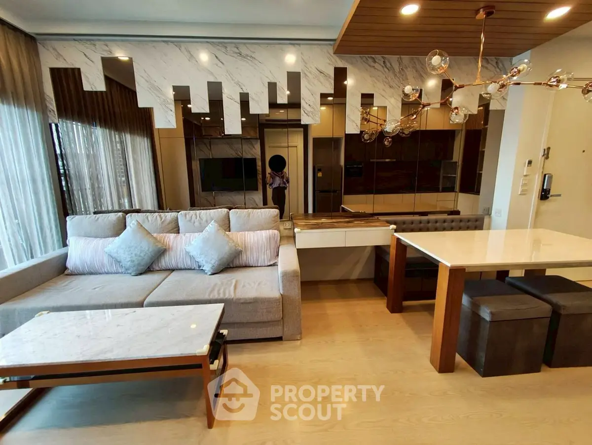 Luxurious modern living room with stylish decor and elegant lighting