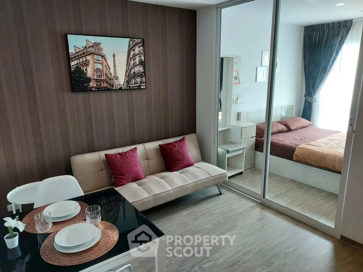 Modern studio apartment with stylish decor and cozy bedroom