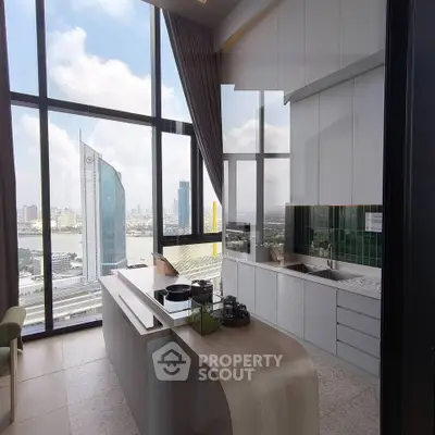 Luxurious modern kitchen with panoramic city view and sleek design