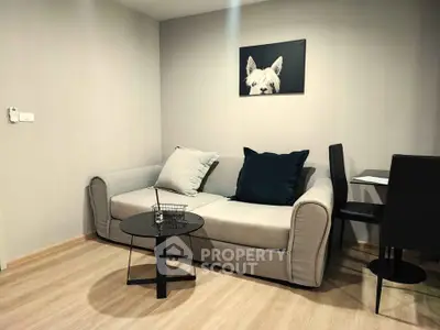 Cozy living room with modern sofa and stylish decor in a contemporary apartment.