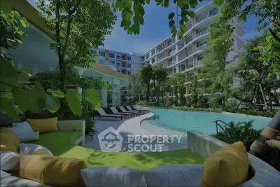 Luxurious apartment complex with stunning pool and lush greenery, perfect for relaxation and modern living.