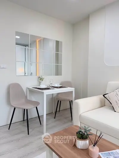 Modern living room with stylish dining area and elegant decor