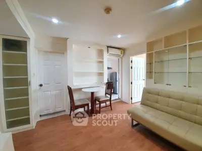 Cozy living room with modern furniture and built-in shelves