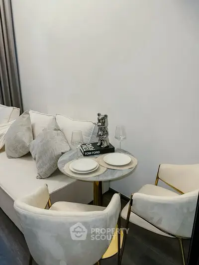 Stylish modern living room with elegant decor and cozy seating area.