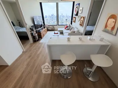 Modern apartment with open layout, stunning city view, and stylish decor